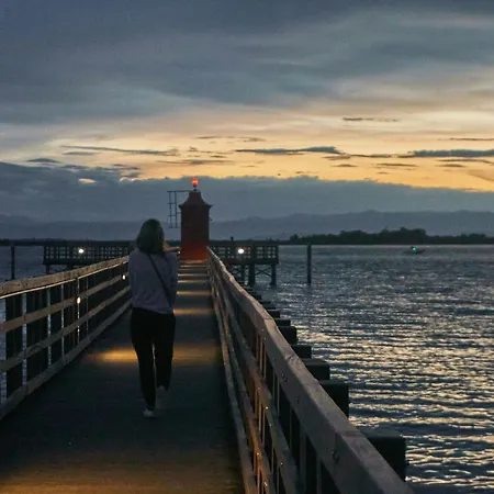 Villa Excellently Equipped Row House With Fenced Garden For 8 In Lignano Pineta