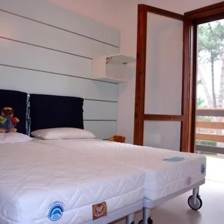 Villa Excellently Equipped Row House With Fenced Garden For 8 In Lignano Pineta Lignano Sabbiadoro