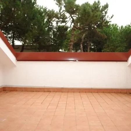 Excellently Equipped Row House With Fenced Garden For 8 In Lignano Pineta *