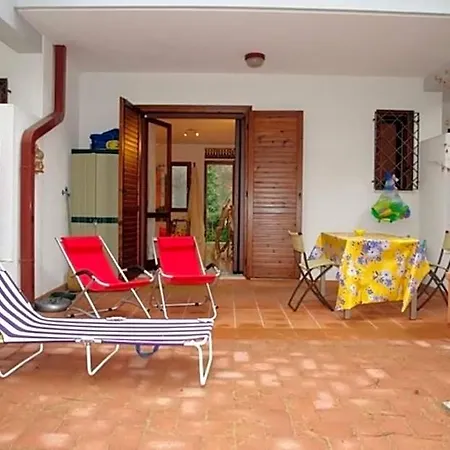 Villa Excellently Equipped Row House With Fenced Garden For 8 In Lignano Pineta