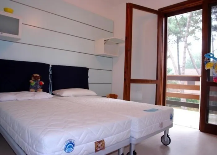 Villa Excellently Equipped Row House With Fenced Garden For 8 In Lignano Pineta Lignano Sabbiadoro