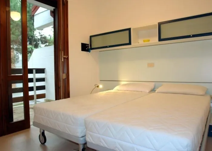 Villa Excellently Equipped Row House With Fenced Garden For 8 In Lignano Pineta Lignano Sabbiadoro