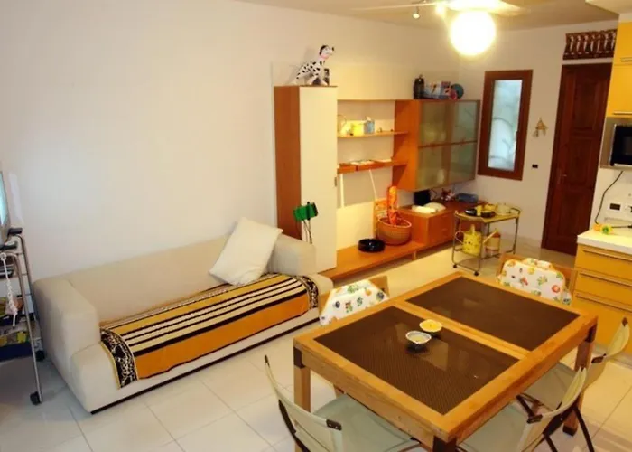 Excellently Equipped Row House With Fenced Garden For 8 In Lignano Pineta Villa